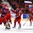 KANATA, CANADA - APRIL 9: Russia's Nadezhda Alexandrova #31 and Anna Shibanova #70 celebrate after a 2-0 shutout over Team Finland during bronze medal round action at the 2013 IIHF Ice Hockey Women's World Championship. (Photo by Jana Chytilova/HHOF-IIHF Images)
